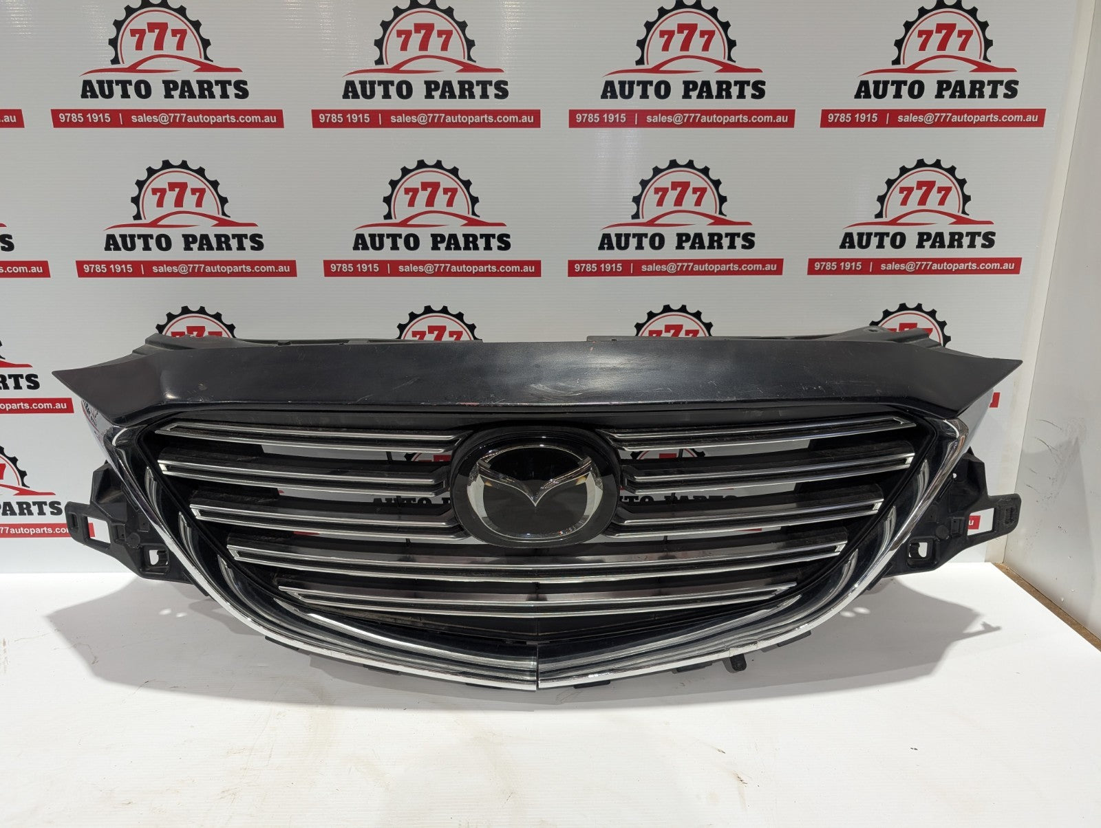 MAZDA CX9 GRILLE RADIATOR GRILLE, TC, STRIP TYPE, SILVER, NON CAMERA TYPE, 07/16